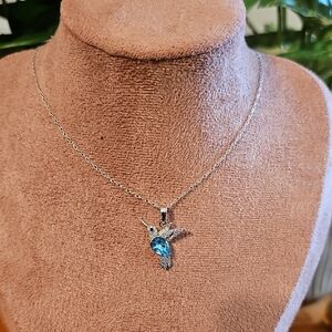 Dazzling Silver Necklace with Blue Crystal Pendant